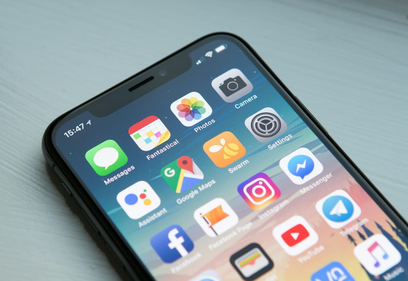 Close-up of app icons on a smartphone home screen